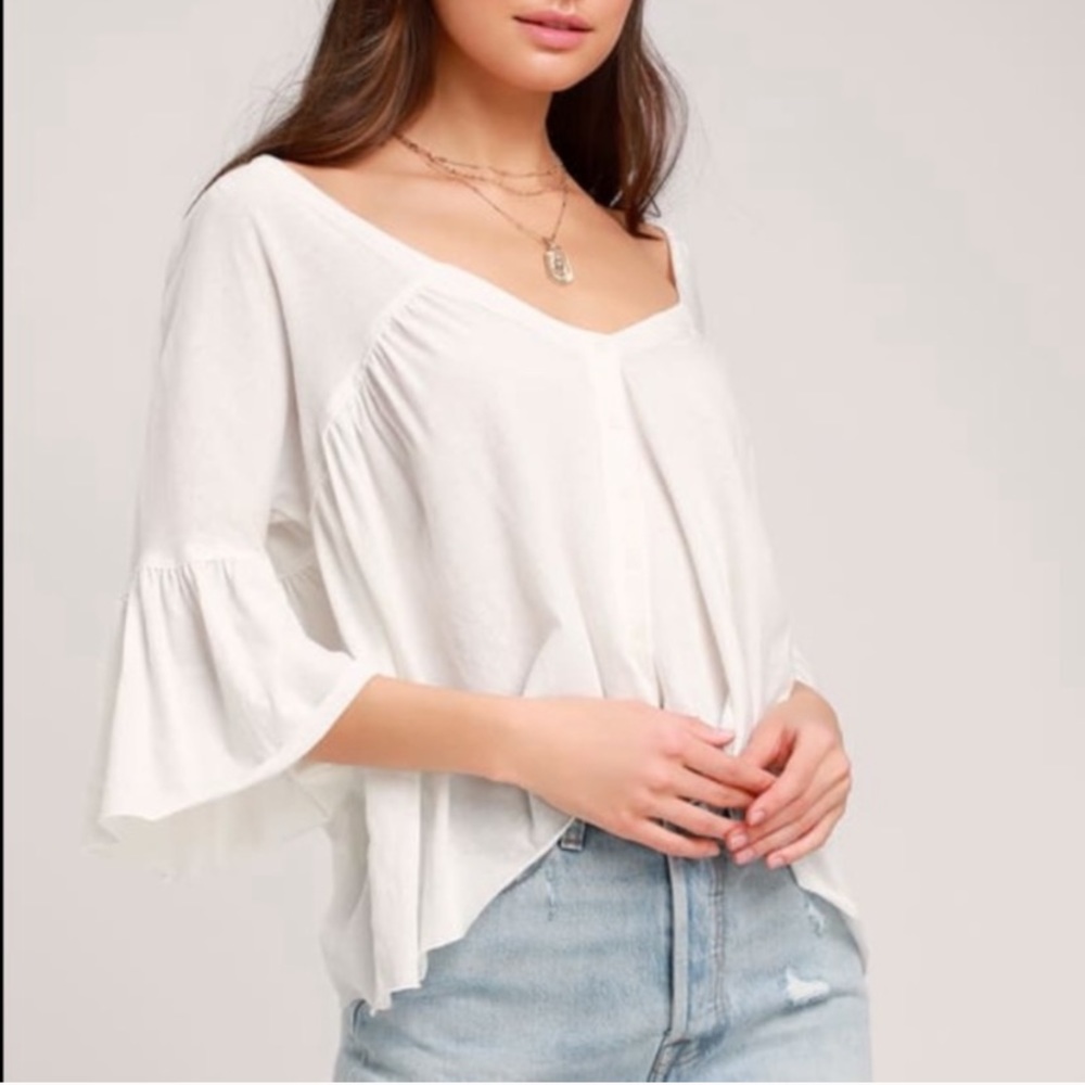 NWT Free People “Sweet Little Tee” in ivory.